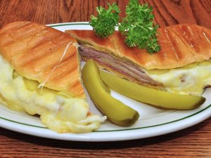 florida-the-sunshine-state-is-known-for-its-cuban-sandwich-with-generous-portions-of-ham-roasted-pork-swiss-cheese-pickles-and-mustard-all-on-two-slices-of-cuban-bread